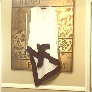 BCBG top. Never worn. Unique cut.